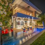 Contemporary architect-designed villa on golfour values front